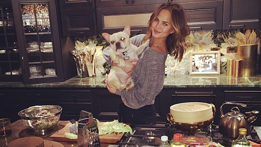 Chrissy Teigen in her modern celebrity kitchen